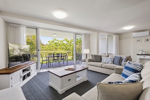 Comfort Apartment, Patio, Garden View | Living area | TV - Sunshine Vista (Sunshine Beach)