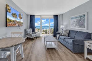 Signature Condo, 1 Bedroom, Balcony, Ocean View | Living room | 65-inch Smart TV with digital channels