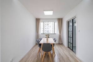 Superior Apartment, 4 Bedrooms, Kitchen, City View | Living room | 55-inch Smart TV with cable channels