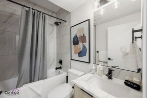 Hair dryer, towels, soap, shampoo