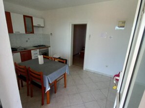 Apartment (Classic One Bedroom Apartment with Te) | Dining room - Berti Sun & Sea Apartments (Hvar)