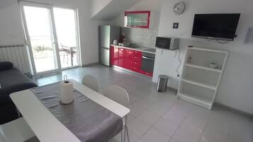 Apartment (One Bedroom Apartment with Balcony an) | Living room