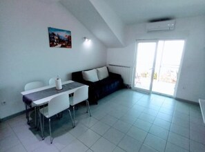 Apartment (One Bedroom Apartment with Balcony an) | Living room