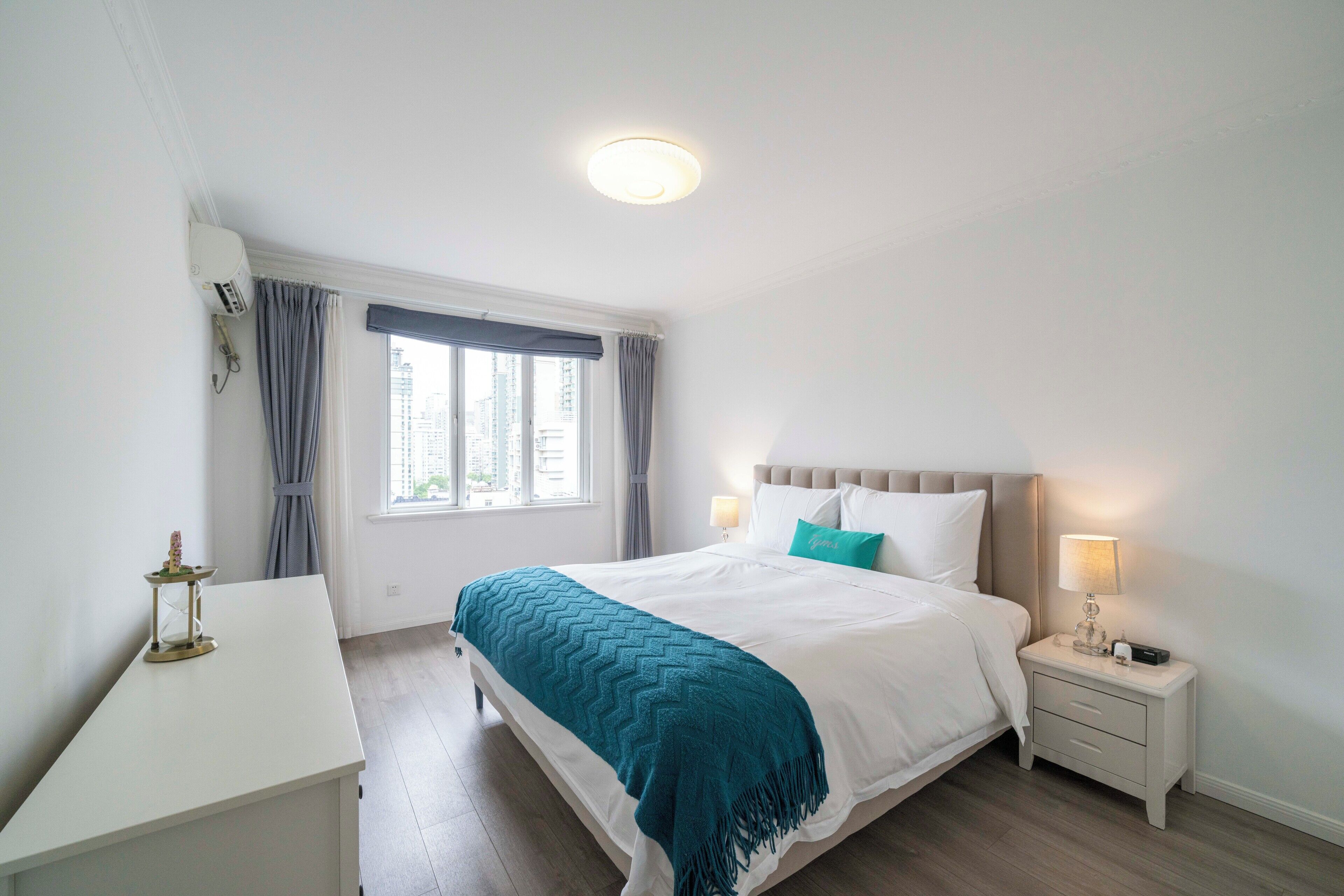 Superior appartement, 2 slaapkamers, keuken, uitzicht op stad | Een strijkplank/strijkijzer, gratis wifi