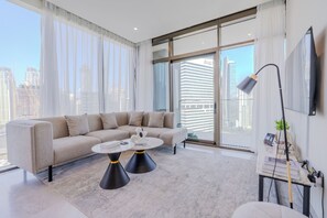 Deluxe-Apartment, Balkon, Stadtblick | Wohnbereich