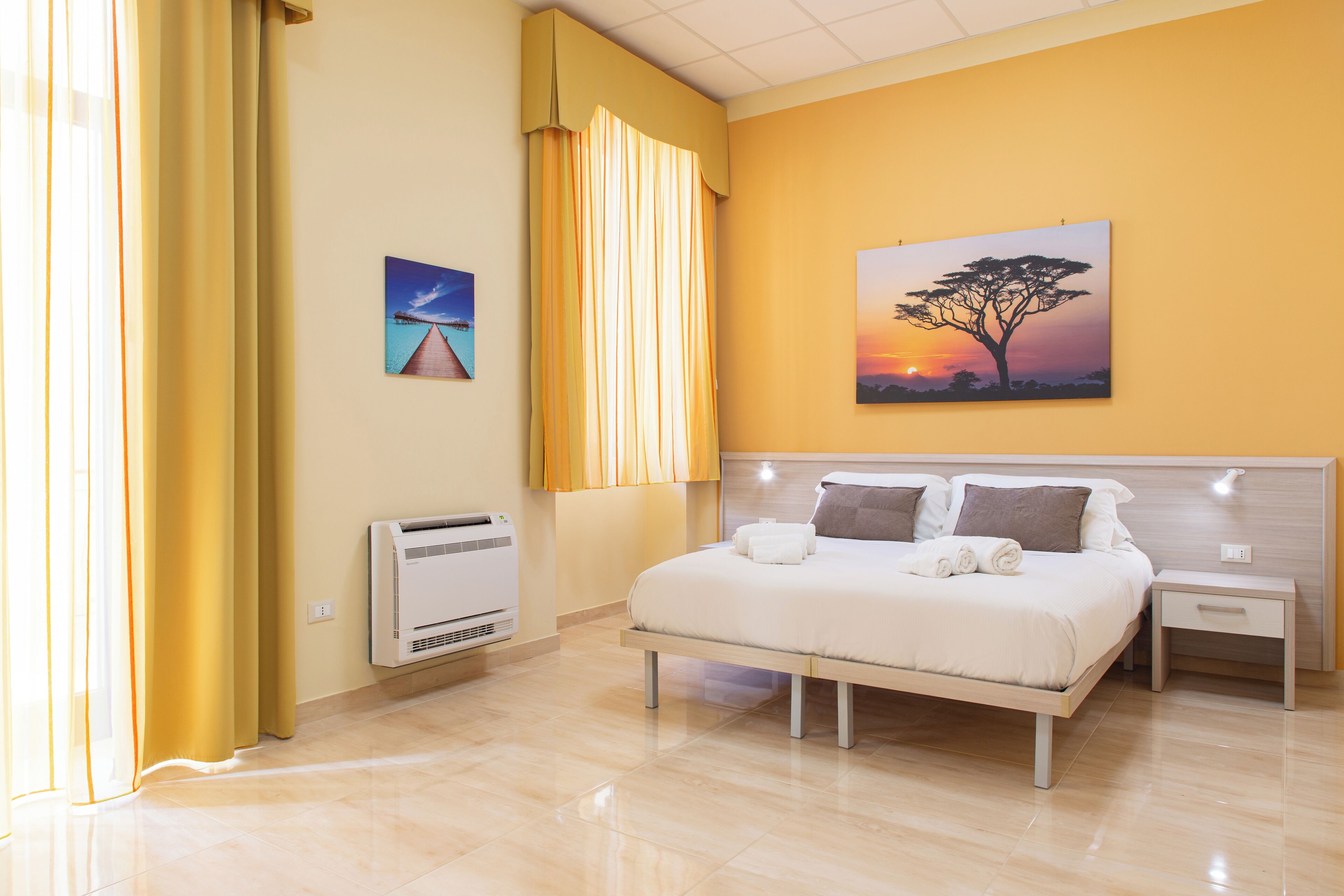 Classic Double or Twin Room | Minibar, in-room safe, desk, iron/ironing board