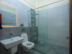 Shower, hair dryer, towels, soap