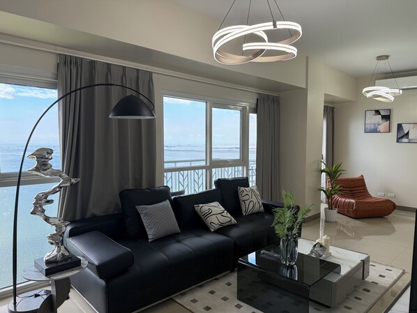 Appartement Deluxe, balcon, vue mer | Coin séjour