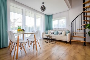 Chalet, 2 Bedrooms | Living room | Flat-screen TV - Domki Perła Białki z Jacuzzi (Bukowina Tatrzanska)