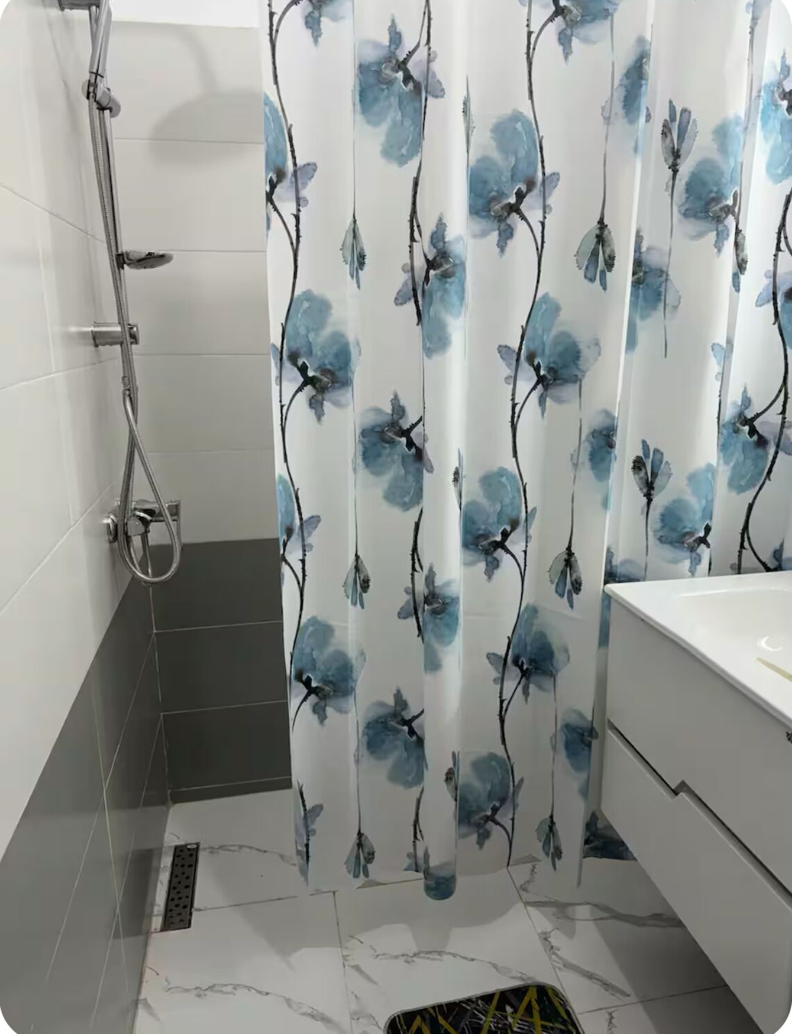 Shower, towels, soap, toilet paper