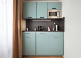 Fridge, stovetop, espresso maker, electric kettle