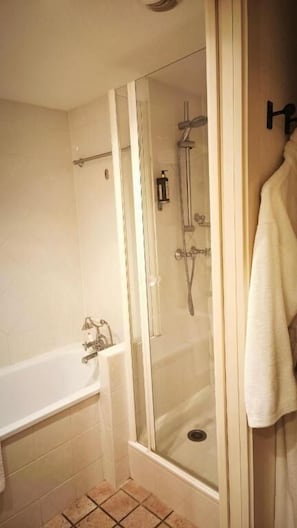 Separate tub and shower, hydromassage showerhead, hair dryer, bathrobes