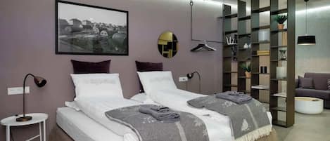 1 habitación, tabla de planchar con plancha, cuna de viaje y wifi