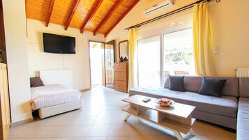 Luxury Apartment, Balcony, Ocean View | Living area | TV