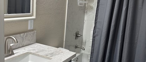 Hair dryer, towels, soap, toilet paper