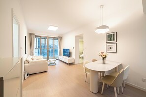 Superior Apartment, 1 Queen Bed, Kitchen, City View | Living room | 55-inch Smart TV with cable channels - Tyms  1BR APT Hongqiao Yucui Garden (Shanghai)