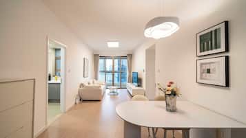 Superior Apartment, 1 Queen Bed, Kitchen, City View | Living room | 55-inch Smart TV with cable channels