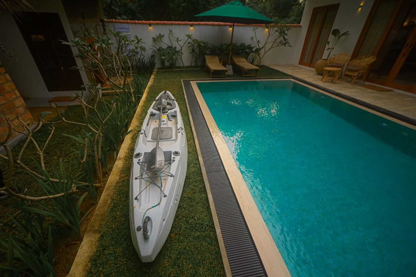 Outdoor pool, pool umbrellas, pool loungers