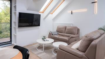 Apartemen (32) | Area keluarga | TV layar datar