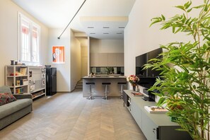 Apartment, 1 Queen-Bett und Schlafsofa | Wohnbereich