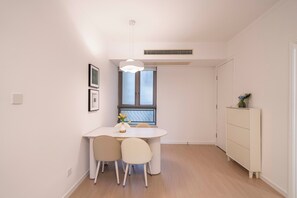 Superior Apartment, 1 Bedroom, Kitchen, City View | Living room | 55-inch Smart TV with cable channels