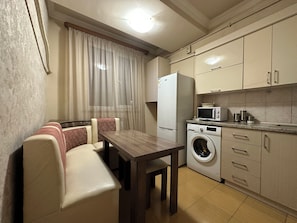 Apartamento económico, vistas a la ciudad | Cocina privada