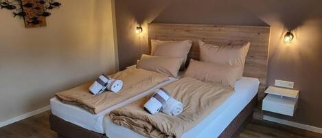 3 slaapkamers, een strijkplank/strijkijzer, wifi, beddengoed