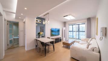 Superior Apartment, 3 Bedrooms, Kitchen, City View | Living room | 55-inch Smart TV with cable channels