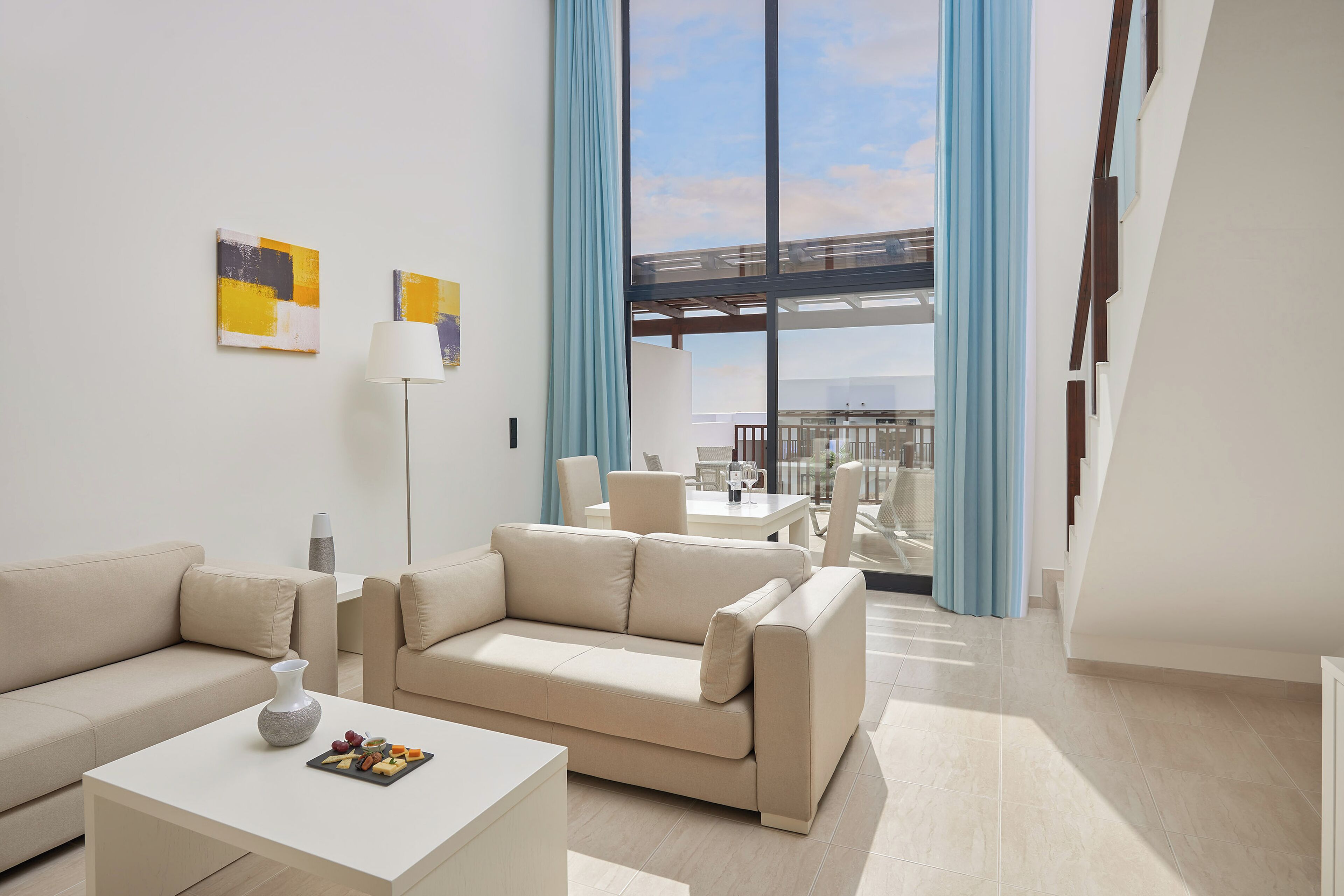 Junior Suite | Minibar, in-room safe, blackout curtains, iron/ironing board