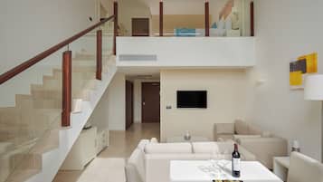 The Level, Junior Suite, Sea View | Minibar, in-room safe, blackout drapes, iron/ironing board