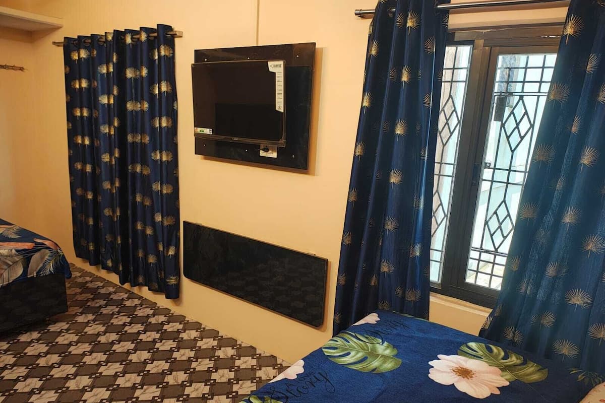 غرفة ديلوكس رباعية | مكتب وواي فاي مجانًا