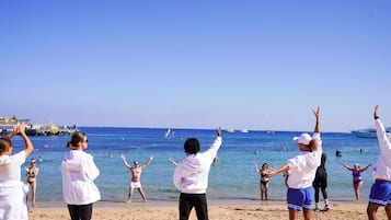 Private beach, free beach shuttle, sun loungers, beach umbrellas