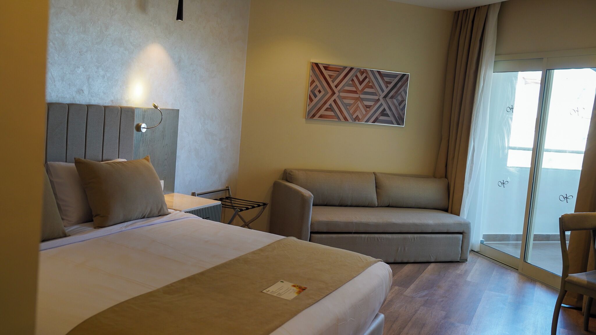 Superior Room | Minibar, in-room safe, individually decorated, blackout drapes