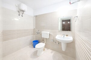 Shower, rainfall showerhead, towels, soap