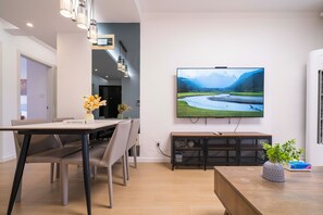 Superior Apartment, 3 Bedrooms, Kitchen, City View | Living room | 55-inch Smart TV with cable channels