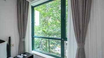 Apartamento superior, 3 quartos, cozinha, vista para a cidade | Vista do quarto