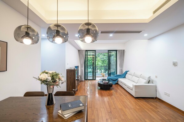 Superior Apartment, 3 Bedrooms, Kitchen, City View | Living room | 55-inch Smart TV with cable channels
