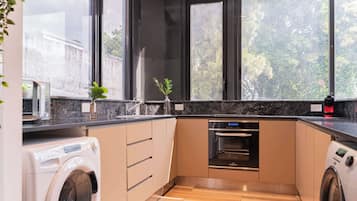 Microwave, coffee/tea maker, toaster, cookware/dishes/utensils