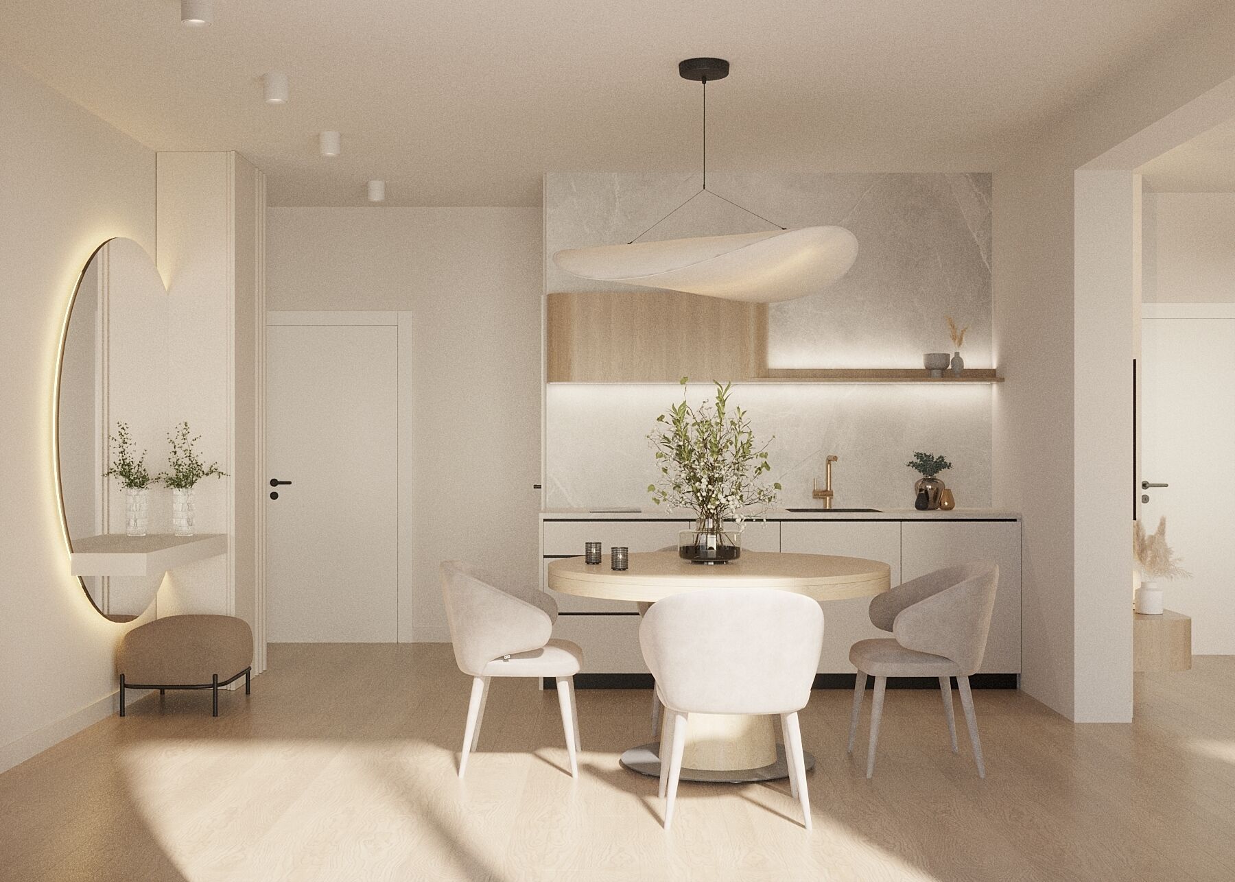Una cucina moderna con un tavolo da pranzo rotondo, sedie bianche e un lampadario.