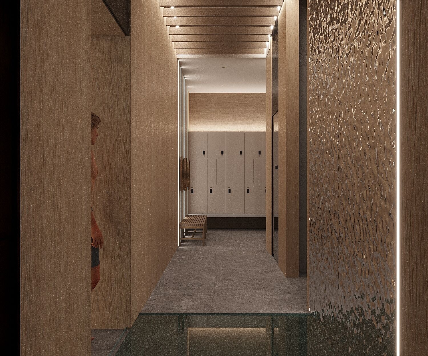 A hallway with lockers, a bench, and a textured wall.