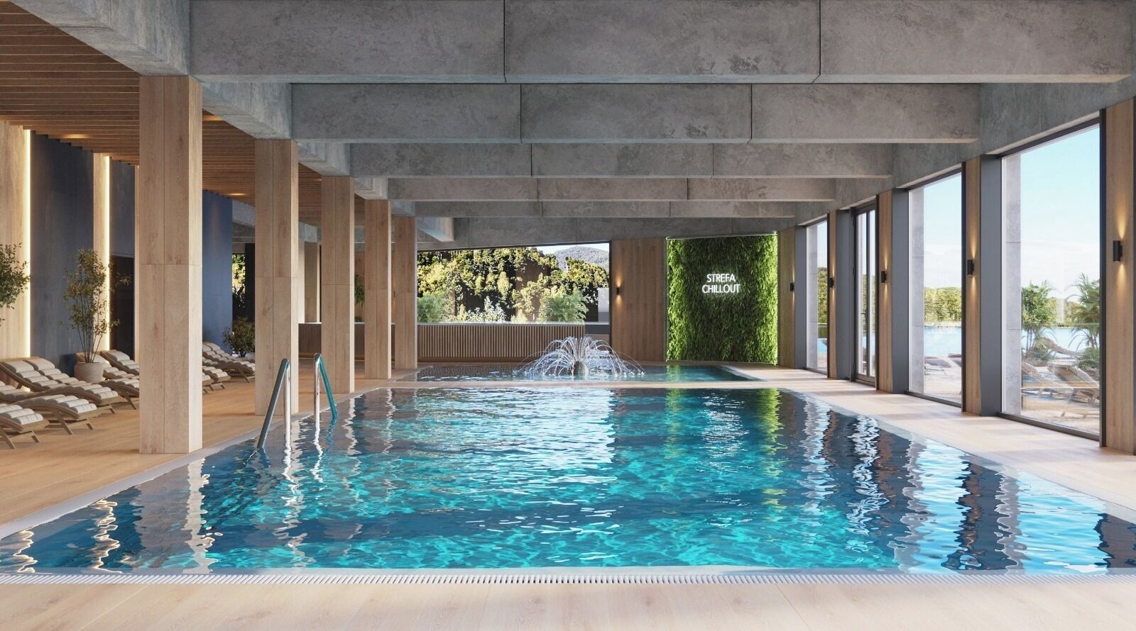 Une piscine intérieure offrant une vue dégagée sur les environs, avec notamment un espace de détente doté de chaises longues et un panneau indiquant « ZONE DE DÉTENTE ».