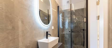 Apartment | Bathroom | Free toiletries, hair dryer, slippers, towels