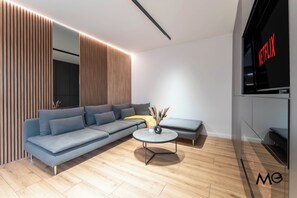 Apartamento | Área de estar | TV de tela plana