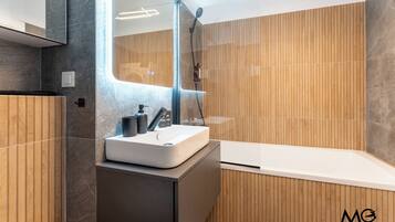 Apartment | Bathroom | Free toiletries, hair dryer, slippers, towels