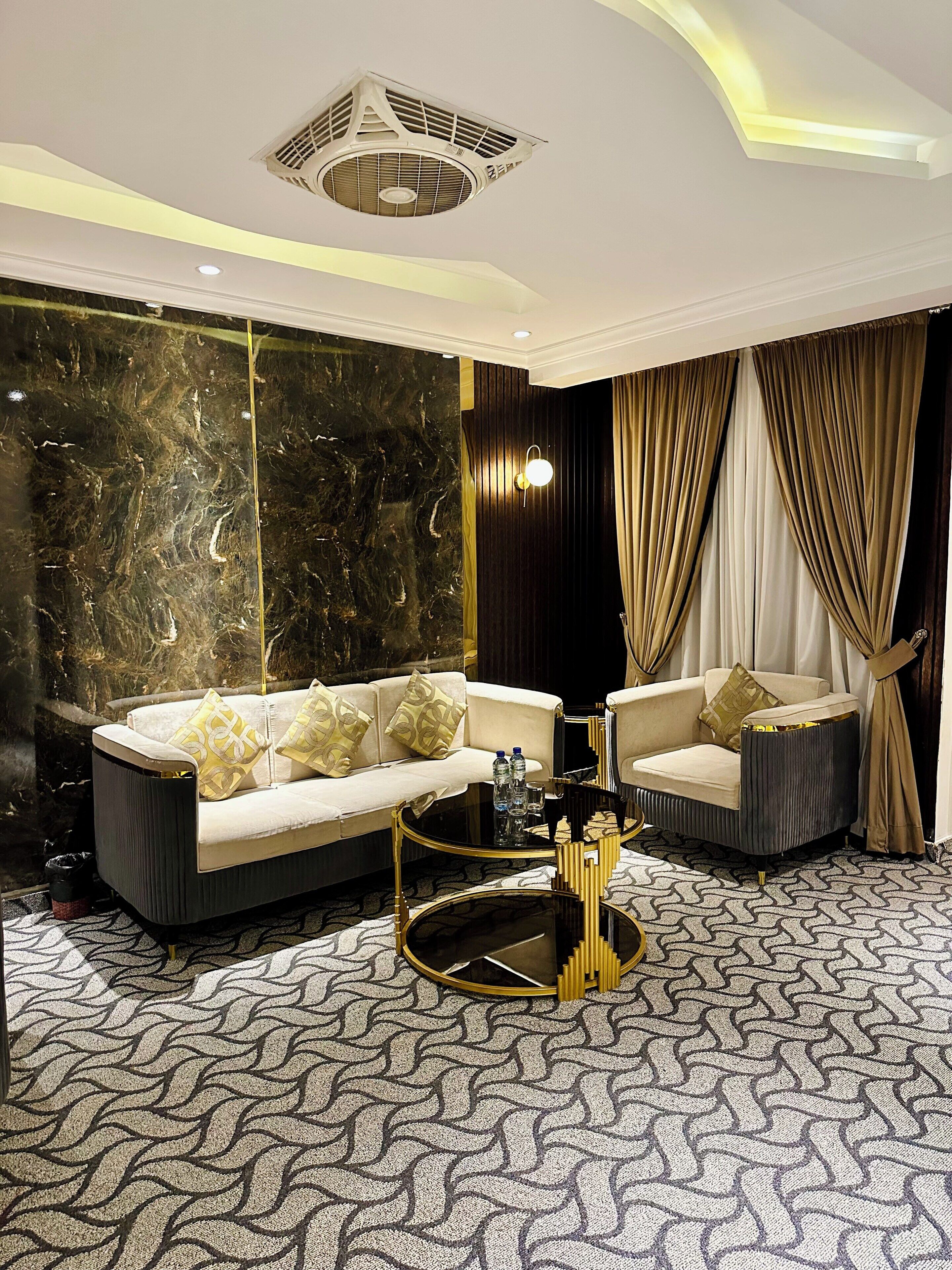 Family Suite | Living area | 32-inch LED TV with digital channels