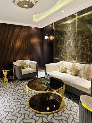 Executive Suite | Living area | 32-inch LED TV with digital channels
