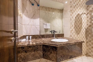 Shower, free toiletries, hair dryer, slippers