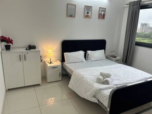 1 habitación, tabla de planchar con plancha, internet y ropa de cama 