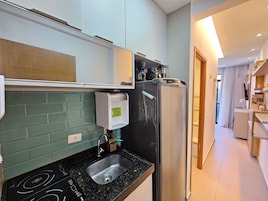 Apartamento Deluxe | Cocina privada