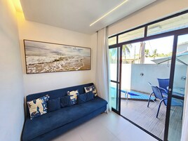 Apartamento Deluxe | Zona de estar